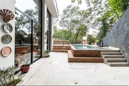 Casa de condomínio à venda com 390m², 4 quartos e 3 vagas