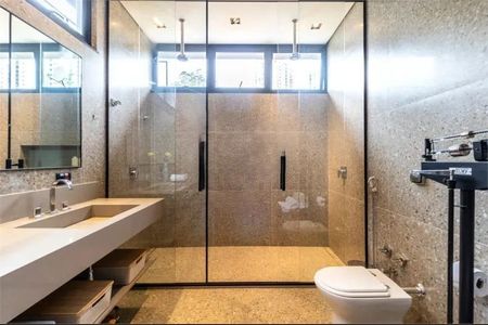 Casa de condomínio à venda com 390m², 4 quartos e 3 vagas