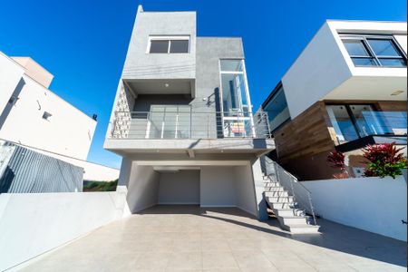 Fachada de casa de condomínio para alugar com 3 quartos, 220m² em Mário Quintana, Viamão