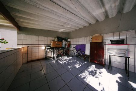 Casa à venda com 400m², 6 quartos e 4 vagas Casa à venda com 400m², 6 quartos e 4 vagasVaranda