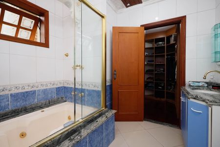 Casa de condomínio à venda com 459m², 4 quartos e 5 vagasBanheiro da Suíte 3