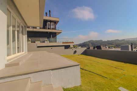 Casa de condomínio à venda com 286m², 4 quartos e 4 vagas Casa de condomínio à venda com 286m², 4 quartos e 4 vagasQuintal