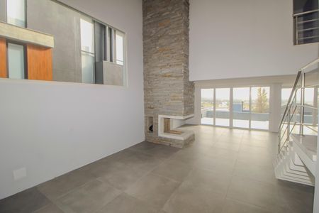 Sala de casa de condomínio à venda com 4 quartos, 286m² em Vila Nova, Porto Alegre