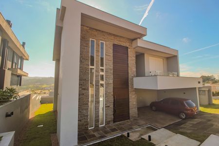 Casa de condomínio à venda com 286m², 4 quartos e 4 vagas Casa de condomínio à venda com 286m², 4 quartos e 4 vagasFachada/Garagem