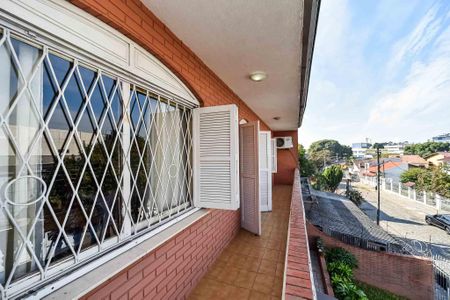 Sacada da Sala 2 de casa à venda com 3 quartos, 240m² em Parque Santa Fé, Porto Alegre
