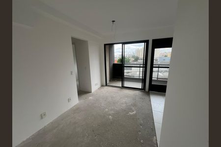 Apartamento à venda com 42m², 2 quartos e 1 vaga Apartamento à venda com 42m², 2 quartos e 1 vagaSala com vista para a cidade, com piso de concreto e paredes brancas, sem móveis ou decoração.