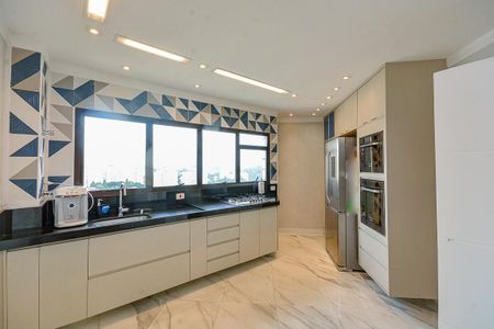 Casa de condomínio para alugar com 210m², 4 quartos e 4 vagasCozinha