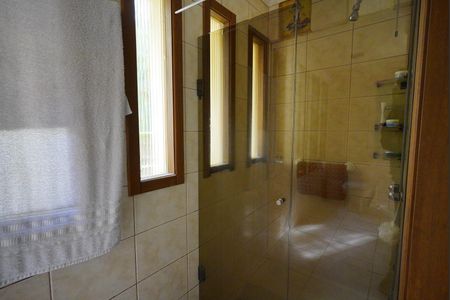 Casa à venda com 387m², 4 quartos e 2 vagas Casa à venda com 387m², 4 quartos e 2 vagasBanheiro da Suíte