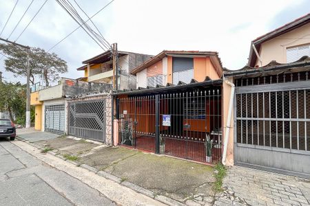 Casa para alugar com 105m², 2 quartos e 2 vagasFachada + plaquinha