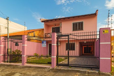 Fachada de casa à venda com 4 quartos, 240m² em Harmonia, Canoas