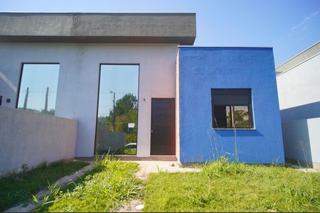 Casa à venda com 57m², 3 quartos e 2 vagasFachada