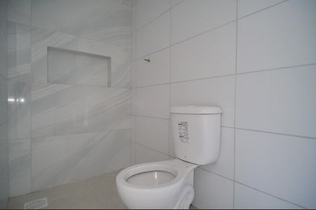 Casa à venda com 58m², 3 quartos e 2 vagasBanheiro da Suíte