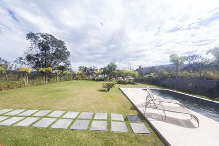 Casa de condomínio à venda com 405m², 4 quartos e 4 vagas Casa de condomínio à venda com 405m², 4 quartos e 4 vagasQuintal