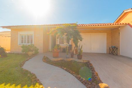 Fachada de casa à venda com 3 quartos, 465m² em Harmonia, Canoas