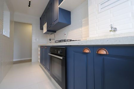 Apartamento à venda com 63m², 3 quartos e 1 vaga Apartamento à venda com 63m², 3 quartos e 1 vagaCozinha e Área de Serviço