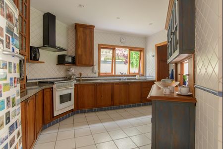 Casa de condomínio à venda com 416m², 4 quartos e 4 vagas Casa de condomínio à venda com 416m², 4 quartos e 4 vagasCozinha