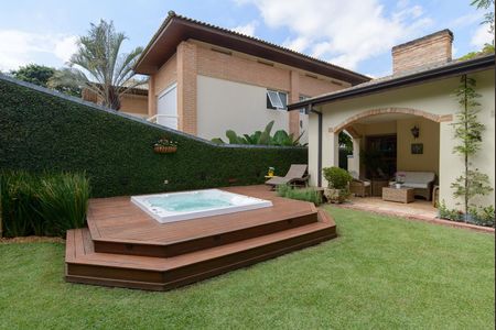 Casa de condomínio à venda com 416m², 4 quartos e 4 vagas Casa de condomínio à venda com 416m², 4 quartos e 4 vagasÁrea externa