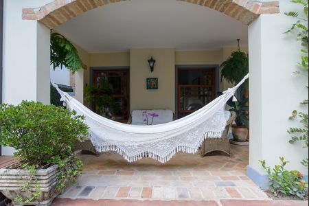 Casa de condomínio à venda com 416m², 4 quartos e 4 vagas Casa de condomínio à venda com 416m², 4 quartos e 4 vagasÁrea externa
