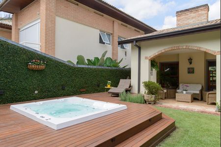 Casa de condomínio à venda com 416m², 4 quartos e 4 vagas Casa de condomínio à venda com 416m², 4 quartos e 4 vagasÁrea externa