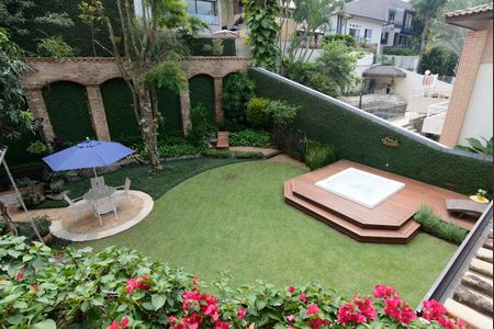 Casa de condomínio à venda com 416m², 4 quartos e 4 vagas Casa de condomínio à venda com 416m², 4 quartos e 4 vagasÁrea externa