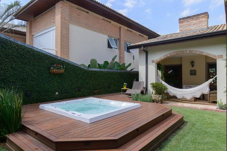 Casa de condomínio à venda com 416m², 4 quartos e 4 vagas Casa de condomínio à venda com 416m², 4 quartos e 4 vagasÁrea externa