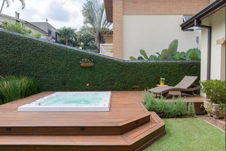 Casa de condomínio à venda com 416m², 4 quartos e 4 vagas Casa de condomínio à venda com 416m², 4 quartos e 4 vagasÁrea externa