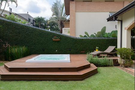 Casa de condomínio à venda com 416m², 4 quartos e 4 vagas Casa de condomínio à venda com 416m², 4 quartos e 4 vagasÁrea externa