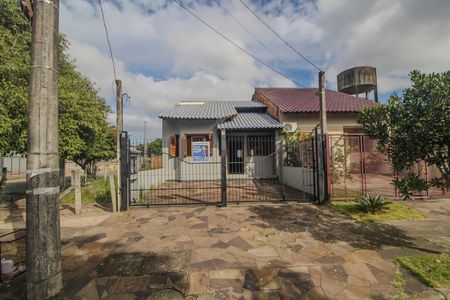 Casa à venda com 69m², 2 quartos e 2 vagas Casa à venda com 69m², 2 quartos e 2 vagasFachada
