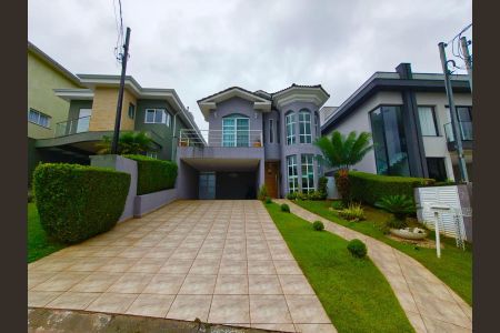 Casa de condomínio para alugar com 360m², 4 quartos e 4 vagas Casa de condomínio para alugar com 360m², 4 quartos e 4 vagasFachada
