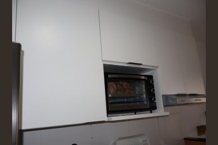 Sala, cozinha e área de serviço de apartamento à venda com 2 quartos, 35m² em Vila Ema, São Paulo