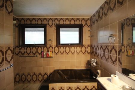 Casa à venda com 388m², 5 quartos e 3 vagasBanheiro da Suíte 1