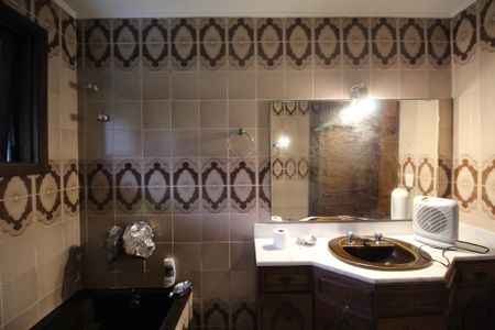Casa à venda com 388m², 5 quartos e 3 vagasBanheiro da Suíte 1