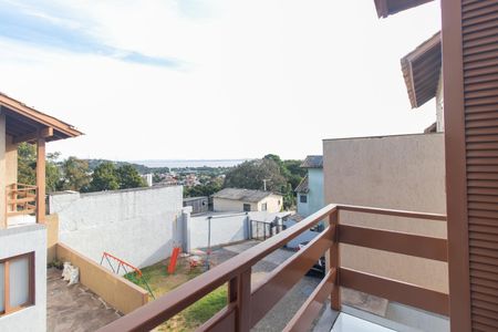 Casa de condomínio à venda com 130m², 2 quartos e 2 vagasVaranda do Quarto 2