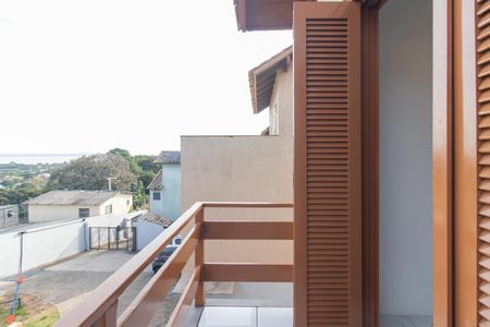 Casa de condomínio à venda com 130m², 2 quartos e 2 vagasVaranda do Quarto 2