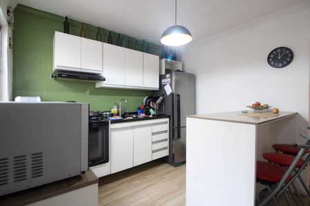 Casa à venda com 90m², 3 quartos e 2 vagas Casa à venda com 90m², 3 quartos e 2 vagasCozinha