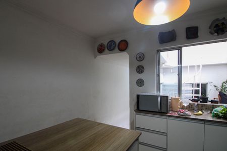 Casa à venda com 90m², 3 quartos e 2 vagas Casa à venda com 90m², 3 quartos e 2 vagasCozinha