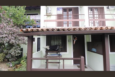 Casa de condomínio para alugar com 80m², 2 quartos e 1 vagaFachada