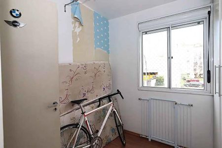 Quarto 1 de apartamento para alugar com 3 quartos, 55m² em Humaitá, Porto Alegre