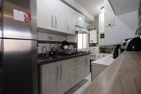 Cozinha de apartamento para alugar com 3 quartos, 55m² em Humaitá, Porto Alegre