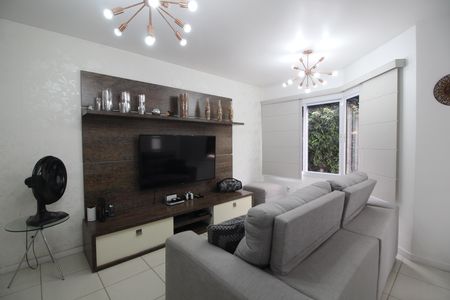 Casa de condomínio à venda com 160m², 4 quartos e 2 vagasSala 1