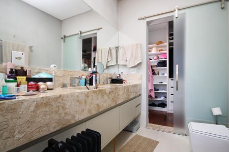 Casa de condomínio para alugar com 358m², 4 quartos e 4 vagasBanheiro Suíte 1