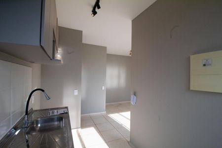 Apartamento à venda com 46m², 2 quartos e 1 vaga Apartamento à venda com 46m², 2 quartos e 1 vagaCozinha e Área de Serviço