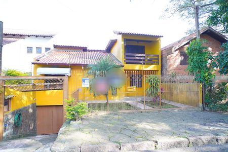 Fachada  de casa à venda com 5 quartos, 270m² em Vila Nova, Porto Alegre