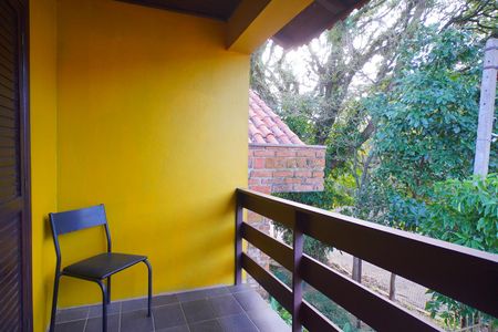 Varanda  de casa à venda com 5 quartos, 270m² em Vila Nova, Porto Alegre