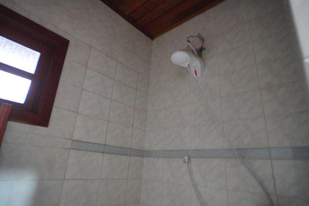Banheiro  de casa à venda com 5 quartos, 270m² em Vila Nova, Porto Alegre