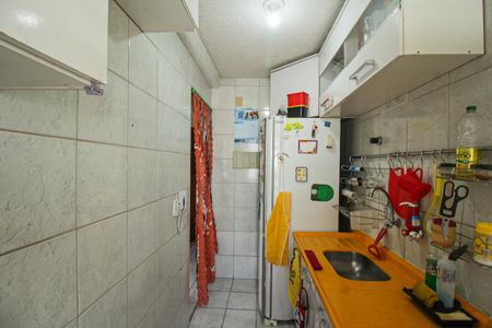 Apartamento à venda com 48m², 3 quartos e 1 vaga Apartamento à venda com 48m², 3 quartos e 1 vagaCozinha e Área de Serviço