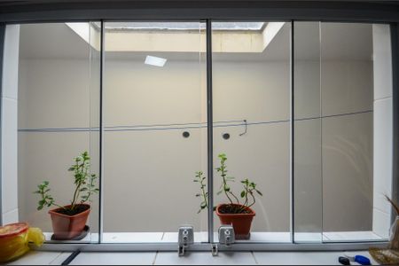 Casa à venda com 150m², 3 quartos e 3 vagas Casa à venda com 150m², 3 quartos e 3 vagasCozinha - Janela