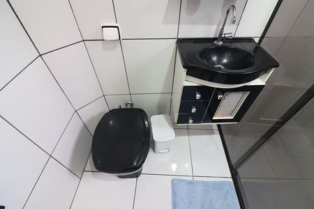 Casa à venda com 180m², 2 quartos e 2 vagasQuarto 1 - Suíte Banheiro 