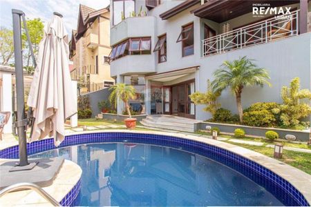 Casa à venda com 452m², 4 quartos e 7 vagas