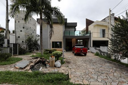 Casa de condomínio para alugar com 345m², 3 quartos e 4 vagas Casa de condomínio para alugar com 345m², 3 quartos e 4 vagasFachada
